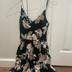 Soprano Black Dress with Floral Accents